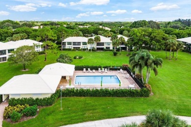 Located on the coveted first floor, convenience is at your on Quail Ridge Golf Course and Country Club in Florida - for sale on GolfHomes.com, golf home, golf lot