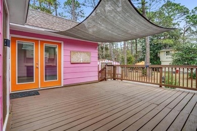 This wonderfully Eclectic Cottage is nestled next to dunes in on Isle Dauphine Club Golf Course in Alabama - for sale on GolfHomes.com, golf home, golf lot