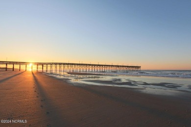 Embark on a journey to this magnificent 3 bedroom 2 bath home on Oyster Bay Golf Links in North Carolina - for sale on GolfHomes.com, golf home, golf lot