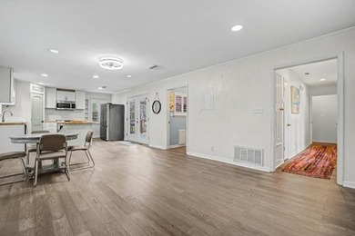 This wonderfully Eclectic Cottage is nestled next to dunes in on Isle Dauphine Club Golf Course in Alabama - for sale on GolfHomes.com, golf home, golf lot