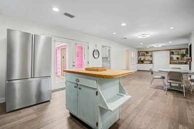 This wonderfully Eclectic Cottage is nestled next to dunes in on Isle Dauphine Club Golf Course in Alabama - for sale on GolfHomes.com, golf home, golf lot