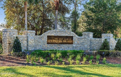 Located within the gated section of the Cypress Head golf on The Golf Club At Cypress Head in Florida - for sale on GolfHomes.com, golf home, golf lot