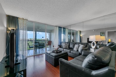 This bright 2-bedroom, 2-bath corner unit offers comfortable on Inverrary Country Club in Florida - for sale on GolfHomes.com, golf home, golf lot