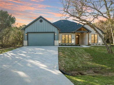 New Reduced price.  Builder is motivated.   This beauty home is on White Bluff Resort - New Course in Texas - for sale on GolfHomes.com, golf home, golf lot