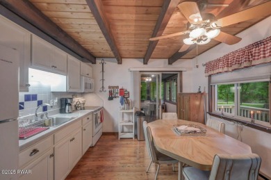 This charming three bedroom, two bathroom home is perfectly on The Hideout Golf in Pennsylvania - for sale on GolfHomes.com, golf home, golf lot
