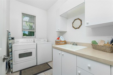 ATTENTION BOATERS AND PRIVACY SEEKERS! This quality Towles-built on Twin Isles Country Club in Florida - for sale on GolfHomes.com, golf home, golf lot