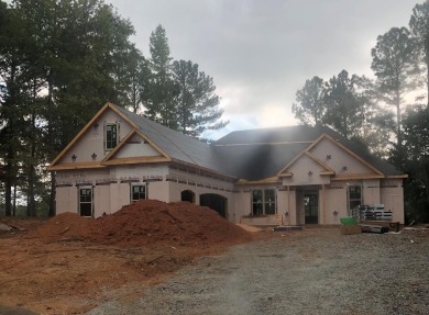 NEW CONSTRUCTION! Live the lake life in the luxurious Grand for sale on GolfHomes.com