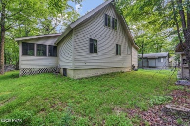 This charming three bedroom, two bathroom home is perfectly on The Hideout Golf in Pennsylvania - for sale on GolfHomes.com, golf home, golf lot