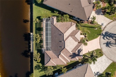 ATTENTION BOATERS AND PRIVACY SEEKERS! This quality Towles-built on Twin Isles Country Club in Florida - for sale on GolfHomes.com, golf home, golf lot