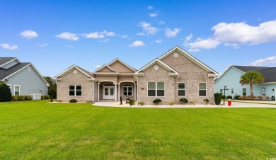 Welcome to this stunning, custom-built home by Jimmy Edwards in on Wild Wing Plantation in South Carolina - for sale on GolfHomes.com, golf home, golf lot