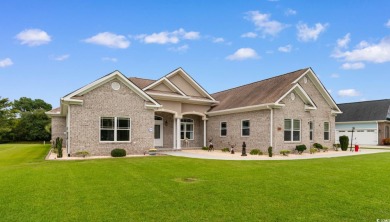 Welcome to this stunning, custom-built home by Jimmy Edwards in on Wild Wing Plantation in South Carolina - for sale on GolfHomes.com, golf home, golf lot