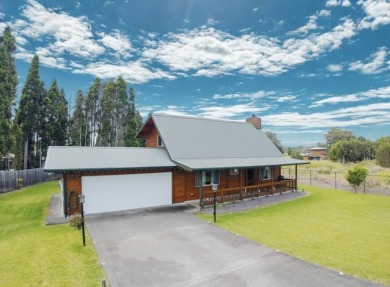 You have GOT to see this stunning cedar home nestled on the on Volcano Golf and Country Club in Hawaii - for sale on GolfHomes.com, golf home, golf lot