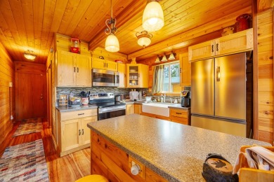 You have GOT to see this stunning cedar home nestled on the on Volcano Golf and Country Club in Hawaii - for sale on GolfHomes.com, golf home, golf lot