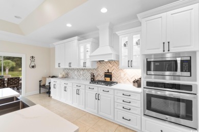Welcome to this stunning, custom-built home by Jimmy Edwards in on Wild Wing Plantation in South Carolina - for sale on GolfHomes.com, golf home, golf lot