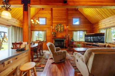 You have GOT to see this stunning cedar home nestled on the on Volcano Golf and Country Club in Hawaii - for sale on GolfHomes.com, golf home, golf lot