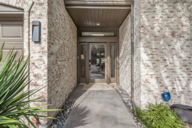 This stunningly remodeled home, backing to the 8th tee box of on Bent Tree Golf Club in Texas - for sale on GolfHomes.com, golf home, golf lot