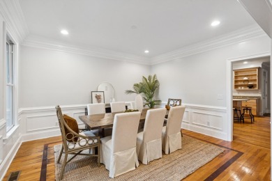 This distinguished two-story brick residence offers four on Dunes West Golf Club in South Carolina - for sale on GolfHomes.com, golf home, golf lot