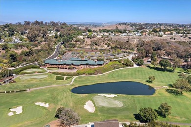 Nestled in the highly desirable East Nine Community, this on El Niguel Country Club in California - for sale on GolfHomes.com, golf home, golf lot