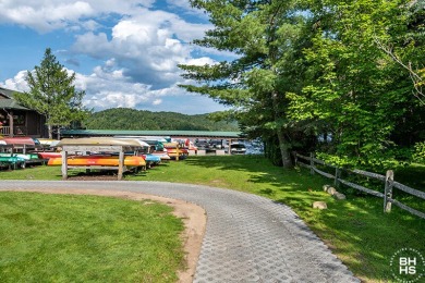 A spectacular lake level unit at the Whiteface Club and Resort on Whiteface Club and Resort in New York - for sale on GolfHomes.com, golf home, golf lot