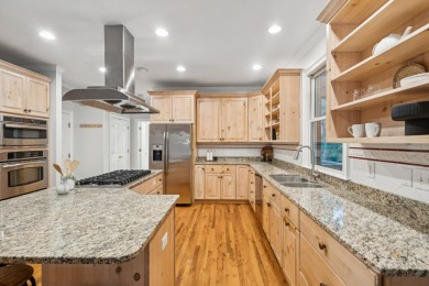 This distinguished two-story brick residence offers four on Dunes West Golf Club in South Carolina - for sale on GolfHomes.com, golf home, golf lot