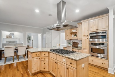 This distinguished two-story brick residence offers four on Dunes West Golf Club in South Carolina - for sale on GolfHomes.com, golf home, golf lot