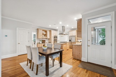 This distinguished two-story brick residence offers four on Dunes West Golf Club in South Carolina - for sale on GolfHomes.com, golf home, golf lot