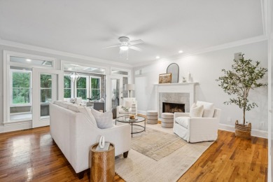 This distinguished two-story brick residence offers four on Dunes West Golf Club in South Carolina - for sale on GolfHomes.com, golf home, golf lot
