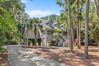 This lovingly maintained low-country style home is set back from on The Seabrook Island Club in South Carolina - for sale on GolfHomes.com, golf home, golf lot