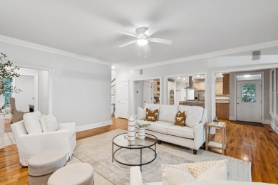 This distinguished two-story brick residence offers four on Dunes West Golf Club in South Carolina - for sale on GolfHomes.com, golf home, golf lot