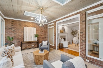 This distinguished two-story brick residence offers four on Dunes West Golf Club in South Carolina - for sale on GolfHomes.com, golf home, golf lot