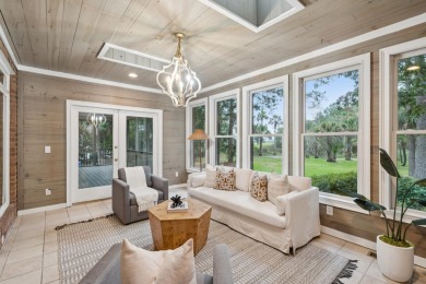 This distinguished two-story brick residence offers four on Dunes West Golf Club in South Carolina - for sale on GolfHomes.com, golf home, golf lot
