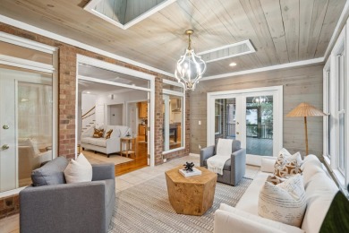 This distinguished two-story brick residence offers four on Dunes West Golf Club in South Carolina - for sale on GolfHomes.com, golf home, golf lot