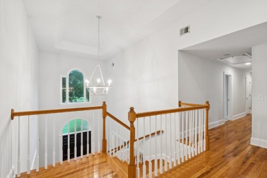 This distinguished two-story brick residence offers four on Dunes West Golf Club in South Carolina - for sale on GolfHomes.com, golf home, golf lot