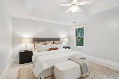 This distinguished two-story brick residence offers four on Dunes West Golf Club in South Carolina - for sale on GolfHomes.com, golf home, golf lot