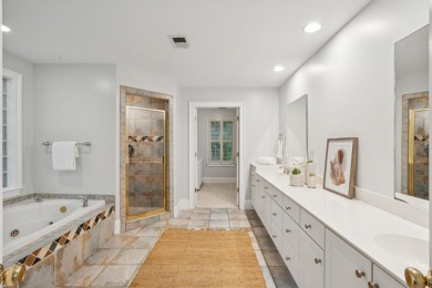 This distinguished two-story brick residence offers four on Dunes West Golf Club in South Carolina - for sale on GolfHomes.com, golf home, golf lot