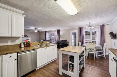 Welcome to 1130 Tributary Way in Dacula - a beautifully designed on Trophy Club of Apalachee in Georgia - for sale on GolfHomes.com, golf home, golf lot