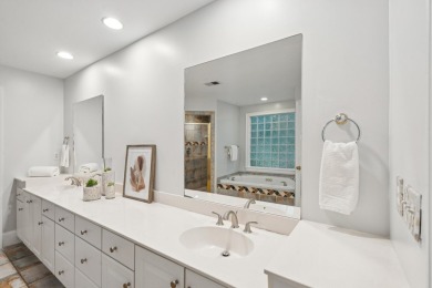 This distinguished two-story brick residence offers four on Dunes West Golf Club in South Carolina - for sale on GolfHomes.com, golf home, golf lot