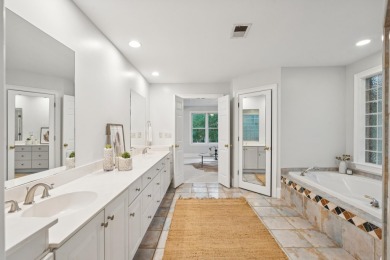 This distinguished two-story brick residence offers four on Dunes West Golf Club in South Carolina - for sale on GolfHomes.com, golf home, golf lot