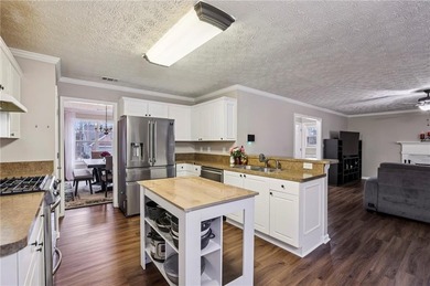 Welcome to 1130 Tributary Way in Dacula - a beautifully designed on Trophy Club of Apalachee in Georgia - for sale on GolfHomes.com, golf home, golf lot