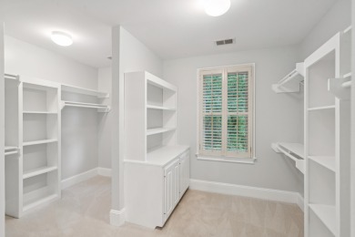 This distinguished two-story brick residence offers four on Dunes West Golf Club in South Carolina - for sale on GolfHomes.com, golf home, golf lot