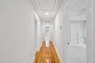 This distinguished two-story brick residence offers four on Dunes West Golf Club in South Carolina - for sale on GolfHomes.com, golf home, golf lot