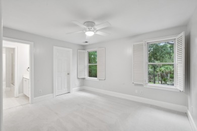 This distinguished two-story brick residence offers four on Dunes West Golf Club in South Carolina - for sale on GolfHomes.com, golf home, golf lot