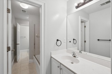 This distinguished two-story brick residence offers four on Dunes West Golf Club in South Carolina - for sale on GolfHomes.com, golf home, golf lot