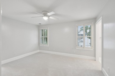 This distinguished two-story brick residence offers four on Dunes West Golf Club in South Carolina - for sale on GolfHomes.com, golf home, golf lot