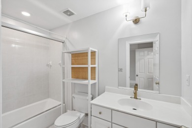 This distinguished two-story brick residence offers four on Dunes West Golf Club in South Carolina - for sale on GolfHomes.com, golf home, golf lot