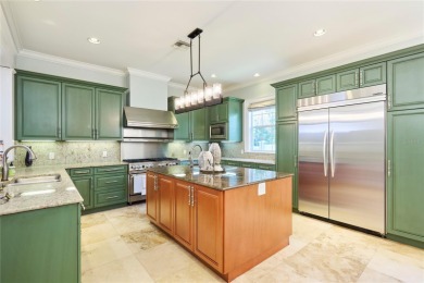 Exquisite mediterranean style pool home on .36-acre lot located on Palma Ceia Golf and Country Club in Florida - for sale on GolfHomes.com, golf home, golf lot