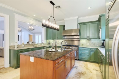 Exquisite mediterranean style pool home on .36-acre lot located on Palma Ceia Golf and Country Club in Florida - for sale on GolfHomes.com, golf home, golf lot