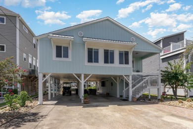 Welcome to your dream coastal escape in Cherry Grove, where on Tidewater Golf Club and Plantation in South Carolina - for sale on GolfHomes.com, golf home, golf lot