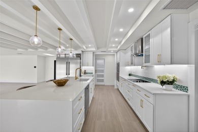 PUNTA GORDA ISLES! STUNNING MODERN 4 BEDROOM PLUS OFFICE, 3.5 on Saint Andrews South Golf Club in Florida - for sale on GolfHomes.com, golf home, golf lot