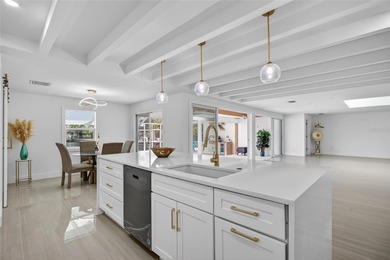 PUNTA GORDA ISLES! STUNNING MODERN 4 BEDROOM PLUS OFFICE, 3.5 on Saint Andrews South Golf Club in Florida - for sale on GolfHomes.com, golf home, golf lot